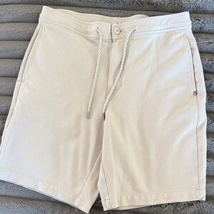 Vuori Men's Light Cream Flat Front Shorts
